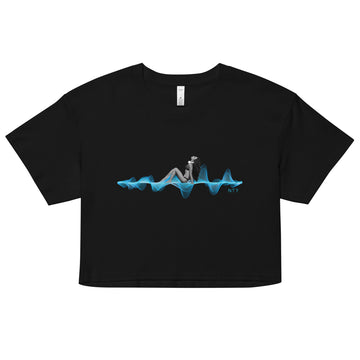 Woman with Headphones Sunbathing on a 3D Sound Wave - Women's Crop Top